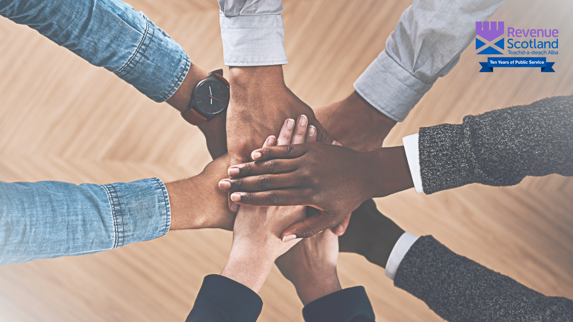 Various hands together in a circle